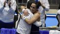 2023-11-09 12:28:58 Italy's Martina Trevisan celebrates with Italy's coach Tathiana Garbin after winning Germany's Eva Lys during the group stage group B singles tennis match between Italy and Germany on the day 3 of the Billie Jean King Cup Finals 2023 in La Cartuja stadium in Seville on November 9, 2023. 
CRISTINA QUICLER / AFP