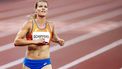 2021-08-02 20:26:18 TOKIO - Dafne Schippers tijdens de halve finale 200 meter in het Olympisch Stadion tijdens het atletiektoernooi van de Olympische Spelen in Tokio. ANP ROBIN VAN LONKHUIJSEN