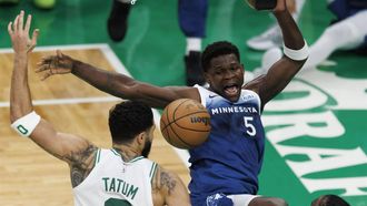 epa11068347 Minnesota Timberwolves guard Anthony Edwards (R) reacts to being fouled by Boston Celtics forward Jayson Tatum (L) during the second quarter of the NBA game between the Boston Celtics and the Minnesota Timberwolves in Boston, Massachusetts, USA, 10 January 2024.  EPA/CJ GUNTHER  SHUTTERSTOCK OUT