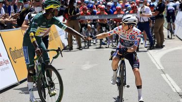 epa11485181 Green jersey Eritrean rider Biniam Girmay (L) of Intermarche-Wanty bump fists with Danish rider Jonas Vingegaard of Team Visma Lease a Bike ahead of the start of the 18th stage of the 2024 Tour de France cycling race over 179km from Gap to Barcelonnette, France, 18 July 2024.  EPA/GUILLAUME HORCAJUELO