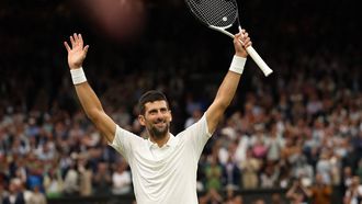 2023-07-14 16:26:39 epa10746219 Novak Djokovic of Serbia celebrates winning his Men's Singles semi-final match against Jannik Sinnner of Italy at the Wimbledon Championships, Wimbledon, Britain, 14 July 2023.  EPA/NEIL HALL   EDITORIAL USE ONLY