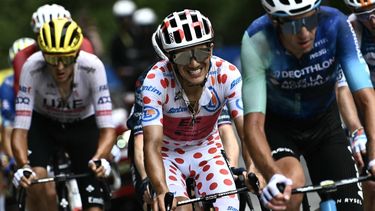 EF Education - EasyPost team's Ecuadorian rider Richard Carapaz (C) wearing the climber's polka dot (dotted) jersey, Decathlon AG2R La Mondiale Team's French rider Bruno Armirail (R) and UAE Team Emirates team's Spanish rider Marc Soler (L) cycle in a breakaway in the ascent of the Col de Turini during the 20th stage of the 111th edition of the Tour de France cycling race, 132,8 km between Nice and Col de la Couillole, southeastern France, on July 20, 2024. 
Marco BERTORELLO / AFP