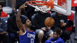 epa10278042 Los Angeles Clippers forward Paul George scores during the third quarter of the NBA basketball game between Houston Rockets and the Los Angeles Clippers at the Crypto.com Arena in Los Angeles, California, 31 October 2022.  EPA/ETIENNE LAURENT SHUTTERSTOCK OUT