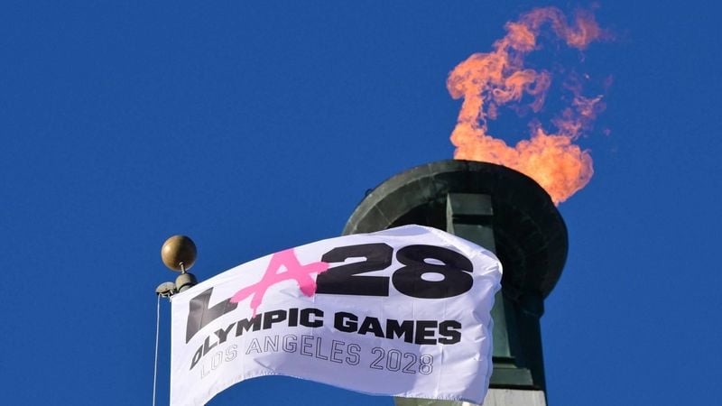 The LA28 Olympic cauldron is lit during a ceremonial lighting at the Memorial Coliseum in Los Angeles on January 13, 2026, ahead of the launch of ticket registration for the 2028 Summer Olympic Games. 
Frederic J. Brown / AFP