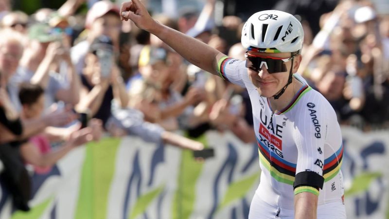 epa12915106 Slovenian rider Tadej Pogacar of team UAE Team Emirates XRG celebrates winning the Liege Bastogne Liege one-day cycling race over 259.5km from Liege to Liege, Belgium, 26 April 2026.  EPA/OLIVIER MATTHYS