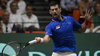 2023-09-15 19:27:48 Serbia's Novak Djokovic returns a ball to Spain's Alejandro Davidovich Fokina during the group stage men's singles match between Spain and Serbia of the Davis Cup tennis tournament at the Fuente San Luis Sports Hall in Valencia on September 15, 2023. 
JOSE JORDAN / AFP