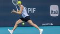 epa11990136 Iga Swiatek of Poland in action against Alexandra Eala of Philippines during their Women’s Singles Quarterfinals match at the 2025 Miami Open tennis tournament at the Hard Rock Stadium in Miami, Florida, USA, 26 March 2025.  EPA/CRISTOBAL HERRERA-ULASHKEVICH
