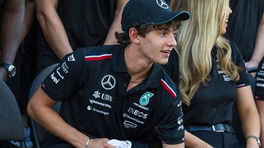 Mercedes' Italian teenage driver Andrea Kimi Antonelli, who will be replacing British driver Lewis Hamilton, arrives to pose for a group photo with their team ahead of the Abu Dhabi Formula One Grand Prix at the Yas Marina Circuit in Abu Dhabi on December 5, 2024. 
Andrej ISAKOVIC / AFP