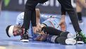 epa11080124 Netherlands' Samir Benghanem lies injured on the floor during the EHF Men's EURO 2024 Group E handball match between Sweden and Netherlands, in Mannheim, Germany, 15 January 2024.  EPA/CHRISTOPHER NEUNDORF