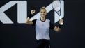 epa11079032 Arantxa Rus of the Netherlands celebrate after winning her first round match against Anhelina Kalinina of Ukraine at the Australian Open tennis tournament in Melbourne, Australia, 15 January 2024.  EPA/MAST IRHAM