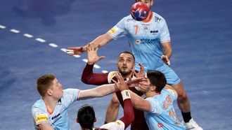 Qatar's left back #44 Amine Guehis (C) fights for the ball during the IHF Men's Handball World Championship Main Round II match between Qatar and The Netherlands at the Arena Varazdin in Varazdin on January 21, 2025. 
Anne-Christine POUJOULAT / AFP