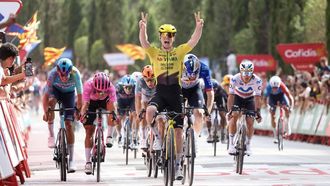 Team Visma-Lease a bike's British rider Matthew Brennan celebrates as he crosses the finish line to win the fifth stage of the Vuelta a Espana 2026, a 173,4 km race between Falset and Roquetes on August 26, 2026.   
Josep LAGO / AFP