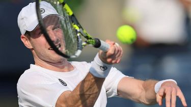 epa11182411 Botic van de Zandschulp of the Netherlands in action during his first round match against Adrian Mannarino of France at the Dubai Open tennis tournament in Dubai, United Arab Emirates, 26 February 2024.  EPA/ALI HAIDER