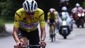 UAE Team Emirates XRG's Slovenian rider Tadej Pogačar wearing the overall leader's yellow jersey cycles leading the race with Team Visma - Lease a Bike's Danish rider Jonas Vingegaard in the background during the 7th stage of the 77th edition of the Criterium du Dauphine cycling race, 131,6 km between Grand-Aigueblanche and Valmeinier, on June 14, 2025. 
Anne-Christine POUJOULAT / AFP