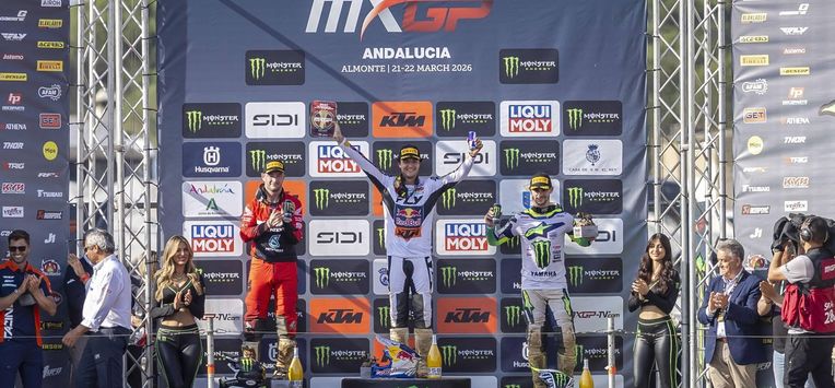 epa12842098 Jeffrey Herlings (L) of Netherlands, Lucas Coenen (c) of Belgium and Tim Gajser (R) of Slovenia celebrate on the podium after the MXGP race at the Motocross World Championship in Almonte, Andalusia, Spain, 22 March 2026.  EPA/ALBERTO DIAZ