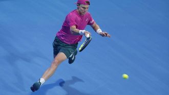 Netherlands’ Jesper De Jong hits a return against Russia's Andrey Rublev during their men’s singles match at the Qatar Open tennis tournament in Doha on February 17, 2026. 
Karim JAAFAR / AFP
