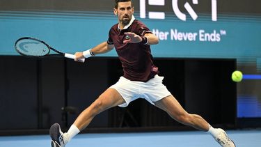 Serbia’s Novak Djokovic hits a return to Australia’s Alex de Minaur during the men’s singles final at the China Open tennis tournament in Beijing on October 6, 2026. 
Greg Baker / AFP