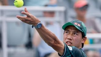 epa10774391 Kei Nishikori of Japan in action against Taylor Fritz of the US during their Men's Singles quarter final match of the Atlanta Open tennis tournament at Atlantic Station in Atlanta, Georgia, USA, 28 July 2023.  EPA/ERIK S. LESSER