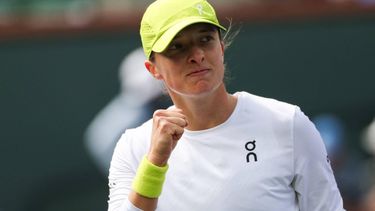 Poland’s Iga Swiatek reacts after defeating China’s Qinwen Zheng during the women’s singles quarter-final tennis match at the BNP Paribas Open at the Indian Wells Tennis Garden in Indian Wells, California, on March 13, 2025. 
Patrick T. Fallon / AFP