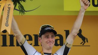 2023-07-21 19:30:20 Bahrain - Victorious' Slovenian rider Matej Mohoric celebrates his victory on the podium after winning the 19th stage of the 110th edition of the Tour de France cycling race 173 km between Moirans-en-Montagne and Poligny, in the Jura department of central-eastern France, on July 21, 2023. 
Thomas SAMSON / AFP