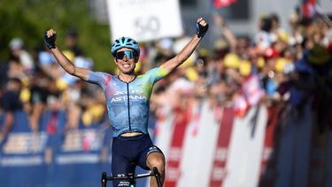 epa12067759 Lorenzo Fortunato from Italy of team XDS Astana raises his arms after crossing the finish line to win the second stage of the Tour de Romandie cycling tour over 157km from La Grande Beroche to La Grande Beroche, Switzerland, 01 May 2025.  EPA/JEAN-CHRISTOPHE BOTT