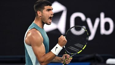 epa11821734 Carlos Alcaraz of Spain celebrates a point during his round 1 match against Alexander Shevchenko of Kazakhstan at the 2025 Australian Open in Melbourne, Australia, 13 January 2025.  EPA/LUKAS COCH AUSTRALIA AND NEW ZEALAND OUT