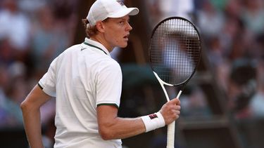 Italy's Jannik Sinner celebrates winning the third set against Germany's Alexander Zverev during their men's singles final tennis match on the fourteenth day of the 2026 Wimbledon Championships at The All England Lawn Tennis and Croquet Club in Wimbledon, southwest London, on July 12, 2026. 
Henry Nicholls / AFP