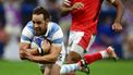 2023-10-14 18:59:37 Argentina's fly-half Nicolas Sanchez dives to score a try during the France 2023 Rugby World Cup quarter-final match between Wales and Argentina at the Stade Velodrome in Marseille, south-eastern France, on October 14, 2023.  
CHRISTOPHE SIMON / AFP