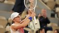 epa11382245 Iga Swiatek of Poland celebrates winning her women's singles third round match against Marie Bouzkova of Czech Republic at the French Open Grand Slam tennis tournament at Roland Garros in Paris, France, 31 May 2024.  EPA/TERESA SUAREZ