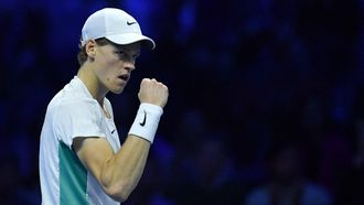 2023-11-12 15:32:01 Italy's Jannik Sinner celebrates a point against Greece's Stefanos Tsitsipas during their first round-robin match at the ATP Finals tennis tournament on November 12, 2023 in Turin. 
Tiziana FABI / AFP