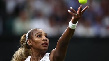 US player Serena Williams serves the ball to Australia's Maya Joint during their women's singles first round tennis match on the second day of the 2026 Wimbledon Championships at The All England Lawn Tennis and Croquet Club in Wimbledon, southwest London, on June 30, 2026. 
HENRY NICHOLLS / AFP