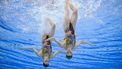 Netherlands' Bregje De Brouwer and Noortje De Brouwer compete in the preliminary round of the women's duet free Group B artistic swimming event during the 2024 World Aquatics Championships at Aspire Dome in Doha on February 7, 2024. 
OLI SCARFF / AFP