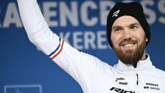 Dutch Joris Nieuwenhuis celebrates on the podium after he won the elite men race of the 