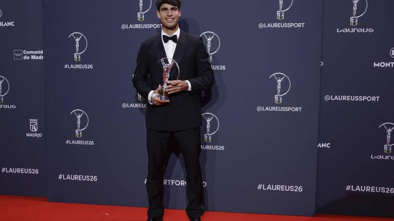 epa12903320 Spanish tennis player Carlos Alcaraz poses with the Sportsman of the Year award at the Laureus World Sports Awards Madrid 2026 in Madrid, Spain, 20 April 2026.  EPA/J.J. Guillen