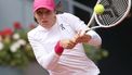 Poland's Iga Swiatek returns the ball to Brazil's Beatriz Haddad Maia during the 2024 WTA Tour Madrid Open tournament quarter-finals tennis match at Caja Magica in Madrid on April 30, 2024. 
PIERRE-PHILIPPE MARCOU / AFP