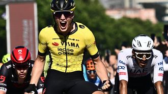 epa11335281 Dutch rider Olav Kooij of Team Visma Lease a Bike celebrates after crossing the finish line to win the 9th stage of the 107th 2024 Giro d'Italia cycling race over 214 km from Avezzano to Naples, Italy, 12 May 2024.  EPA/LUCA ZENNARO