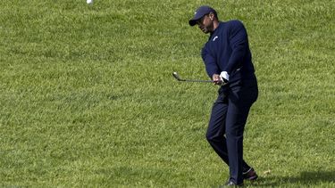 epa11159662 Tiger Woods of the US hits the ball on hole 4 rough during the second round of 2024 The Genesis Invitational at The Riviera Country Club in Los Angeles, California, USA, 16 February 2024.  EPA/ETIENNE LAURENT