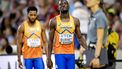 2023-08-25 19:35:11 BOEDAPEST - Nsikak Ekpo en Taymir Burnet na de mislukte wissel op de 4x100 meter estafette  tijdens de zevende dag van de wereldkampioenschappen atletiek. ANP ROBIN VAN LONKHUIJSEN