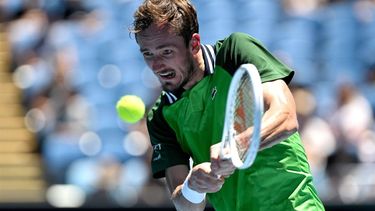 epa11078382 Daniil Medvedev of Russia returns during his first round match against Terence Atmane of France on Day 2 of the 2024 Australian Open at Melbourne Park in Melbourne, Australia, 15 January 2024.  EPA/LUKAS COCH AUSTRALIA AND NEW ZEALAND OUT