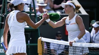 Winner Germany's Laura Siegemund (R) shakes hands with US player Madison Keys during their women's singles third round tennis match on the fifth day of the 2025 Wimbledon Championships at The All England Lawn Tennis and Croquet Club in Wimbledon, southwest London, on July 4, 2025. 
Kirill KUDRYAVTSEV / AFP