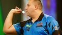 epa11779800 Jermaine Wattimena of the Netherlands in action during the opening session of the Paddy Power World Darts Championship at Alexandra Palace in London, Britain 15 December 2024.  EPA/DAVID CLIFF