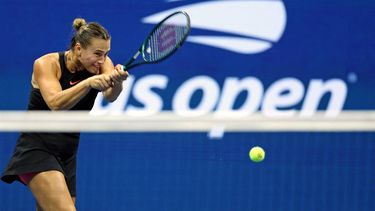 Belarus's Aryna Sabalenka plays a backhand return against USA's Emma Navarro during their women's semifinals match on day eleven of the US Open tennis tournament at the USTA Billie Jean King National Tennis Center in New York City, on September 5, 2024. 
CHARLY TRIBALLEAU / AFP