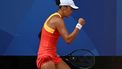 China's Wang Xiyu reacts while playing Poland's Iga Swiatek during their women's singles third round tennis match on Court Philippe-Chatrier at the Roland-Garros Stadium during the Paris 2024 Olympic Games, in Paris on July 30, 2024.  
PATRICIA DE MELO MOREIRA / AFP