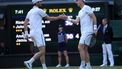 epa11457880 Andy Murray (R) and Jamie Murray (L) of Britain interact as they play against John Peers and Rinky Hijikata of Australia (both unseen) during their Men's doubles 1st round match at the Wimbledon Championships, in Wimbledon, London, Britain, 04 July 2024.  EPA/ADAM VAUGHAN   EDITORIAL USE ONLY