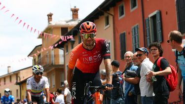 Team Ineos' Italian rider Filippo Ganna rides past supporters before the start of the 19th stage of the 107th Giro d'Italia cycling race, 157km between Mortegliano and Sappada on May 24, 2024. 
Luca Bettini / AFP