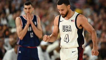 USA's #04 Stephen Curry reacts in the men's semifinal basketball match between USA and Serbia during the Paris 2024 Olympic Games at the Bercy  Arena in Paris on August 8, 2024. 
Aris MESSINIS / AFP