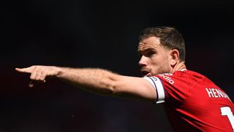 Liverpool's English midfielder Jordan Henderson shouts to teammates during the English Premier League football match between Liverpool and Aston Villa at Anfield in Liverpool, north west England on May 20, 2023. 
PETER POWELL / AFP