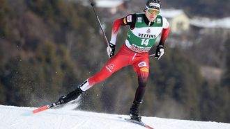 epa09675356 Stefan Rettenegger of Austria in action during the cross country skiing portion of the Men Individual Gundersen NH106/10km competition at the FIS Nordic Combination World Cup in Val di Fiemme, Italy, 09 January 2022.  EPA/ANDREA SOLERO