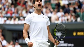 epa11477631 Carlos Alcaraz of Spain reacts during the Men's final against Novak Djokovic of Serbia at the Wimbledon Championships, Wimbledon, Britain, 14 July 2024.  EPA/NEIL HALL  EDITORIAL USE ONLY