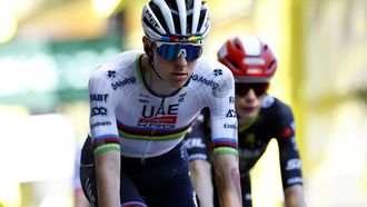 epa12241395 Slovenian rider Tadej Pogacar (L) of UAE Team Emirates arrives ahead of Danish rider Jonas Vingegaard (R) of Team Visma-Lease a Bike at the finish during the 11th stage of the Tour de France cycling race over 156.8km around Toulouse, France, 16 July 2025.  EPA/MARTIN DIVISEK